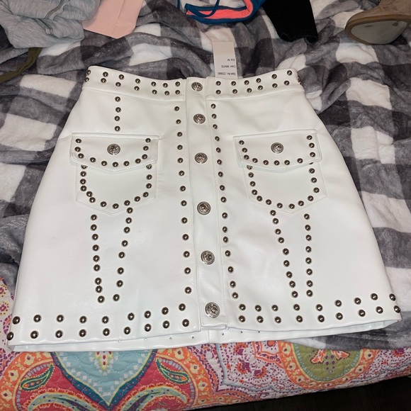 Dresses & Skirts - Leather mini skirt. Bought from RiffRaff in Fayetteville, Arkansas. Never worn.